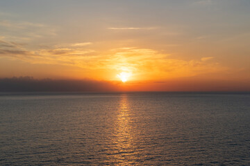 seascape with a beautiful sunset on the background of the sea