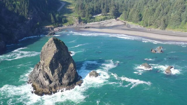 The Pacific Ocean washes against the scenic yet rugged coastline of southern Oregon. This beautiful region of the Pacific Northwest is accessible via highway 101.