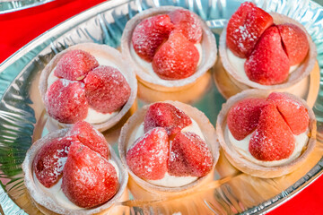 delicious pastries with strawberries at a tasting party