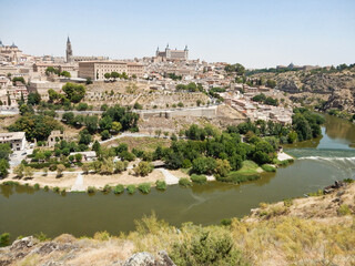 Fototapeta na wymiar View of the Tagus River and Toledo Spain with Alcazar de Toledo on the top of the Hill