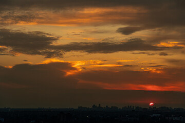 Sky beautiful hot summer background. Detailed clouds at sunrise. Sunny yellow and white sky and...