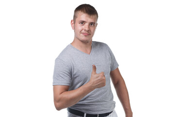 Fototapeta premium Photo of young man with bristle showing thumb