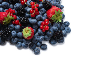 Blackberry, raspberry, blueberry,  red currant and mint background.