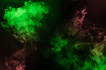 Green and pink steam on a black background.