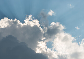 blue sky with clouds - sun rays