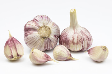 Garlic heads and cloves isolated on a white background.