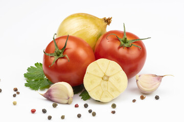 An assortment of fresh vegetables, a mix of peppers isolated on a white background.