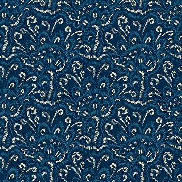 Embroidered seigaiha seamless pattern. Blue and white bohemian print for textiles. Asian wavy motifs. Vector illustration.