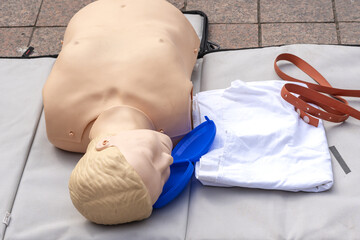 CPR on training doll. resuscitation mannequin.Resuscitation Technique On Dummy .