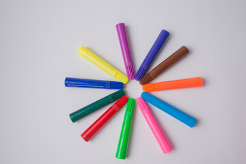 Set of colorful marker pens over white background. Star shaped design