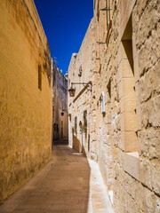 Fototapeta na wymiar Street scene in Mdina, Gozo, an island just north of Malta