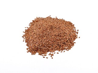 Heap of organic brown flaxseeds on white background. 