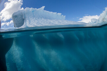 Half above and half below photo of an iceberg off Danco Island