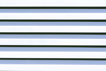 streams on a surface. A background with strips from  color. vertical streams. Background abstract structure. strip, bar, ribbon, stripe texture