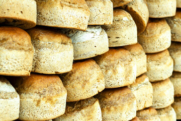 bread loaves in a row. Breads and baked goods close-up.   view of loaves . bakery products