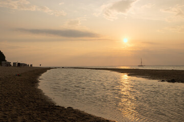 Fototapeta premium beach scene at sunset