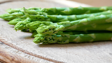 fresh green asparagus from an asparagus field as an ingredient in a kitchen