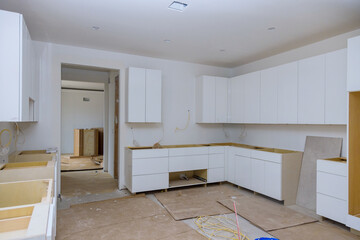 White of kitchen wooden cabinets with contemporary