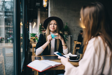 Thoughtful female friends spending time together