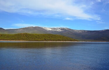 Mountainous coast of Lake Baikal in early summer