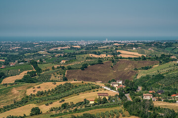 Fototapeta na wymiar Cultivated land on the hills in Rimini province, Emilia and Romagna, Italy.
