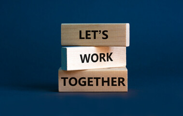 Work together symbol. Wooden blocks with words Let is work together on beautiful grey background. Business, let is work together concept. Copy space.