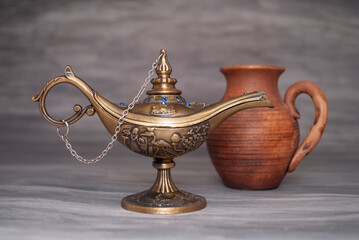 aladdin souvenir lamp on gray background
