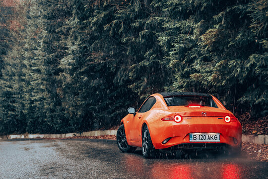 Mazda MX-5 ND RF 30th Anniversary edition Miata rear end shot, stop lights, wheel and exhaust details
