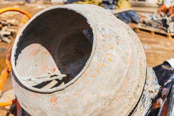 Industrial concrete mixer at a construction site. Preparation of concrete and mortar.