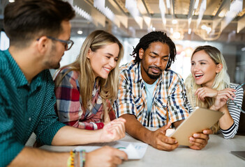 Group of successful business people designers architects in office