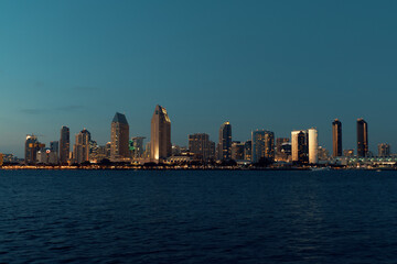 Fototapeta na wymiar san diego city skyline with ocean in front of the buildings at sunset