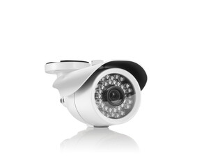 Three-quarter view of round white outdoor surveilance camera with led lights on white background...