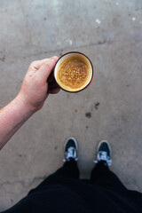 person holding a coffe