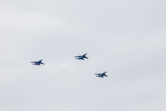 Russia Saint Petersburg 25 July 2021 Military aircraft parade, Navy on the Neva River, in summer Troitsky bridge overlooking the hare island, Petropalovskaya fortress, spire with an angel