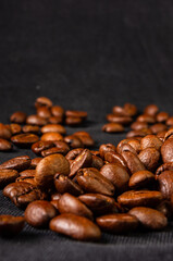 Natural background for Cafe menu or brochure template - macro photo of brown roasted coffee beans, close up