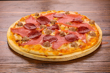 Pizza with ham and pepperoni