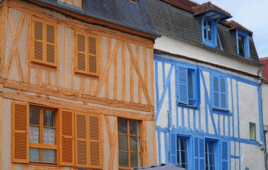 View of colorful medieval Tudor style maison a colombage with wooden beams in Auxerre, capital of the Yonne department in Burgundy