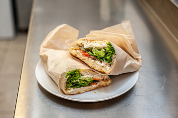 Fresh lettuce with meat and tomatoes for salad or sandwich. Street fast food