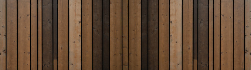 Dark brown wooden facade panel wall texture background banner panorama