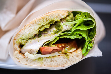 Fresh lettuce with meat and tomatoes for salad or sandwich. Street fast food