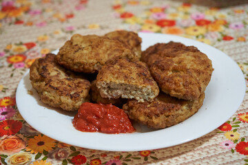 cutlets on a plate,homemade meatballs with minced meat and buckwheat