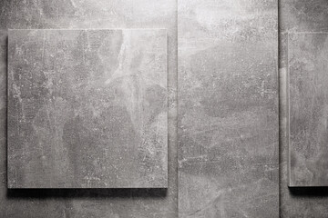 Abstract grey background texture at table or wall surface. Gray piece of chipboard