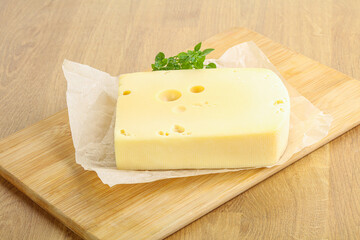 Maasdam cheese over the board