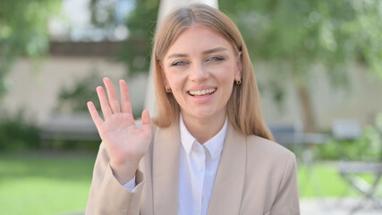 Outdoor Portrait of Businesswoman Talking on Online Video Call 