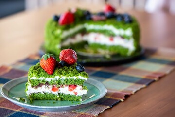 Mossy cake with wild berries