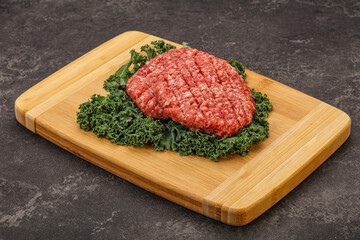 Raw beef burger cutlet for cooking