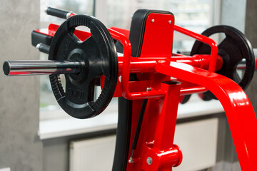 Barbell sports equipment in the gym, close-up