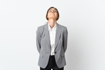 Business Ireland woman isolated on white background and looking up