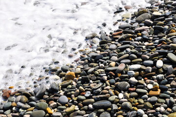 Pebble beach, close-up. Background image.