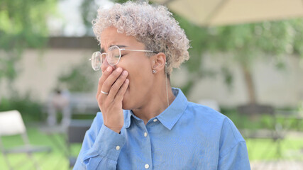 Portrait of Sleeping African Woman Yawning